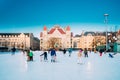 Helsinki, Finland. Children Skating On Rink On Railway Square On Background Of Finnish National Theatre In Winter