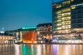 Helsinki, Finland. Kamppi Chapel Or Chapel Of Silence In Evening Illumination On Narinkka Square. Chapel Operated By