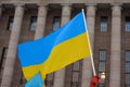 Demonstrator in a rally against RussiaÃ¢â¬â¢s military aggression and occupation of Ukraine carrying Ukrainian flag