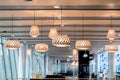 Helsinki, Finland - January 15, 2018: Beautiful wooden geometric modern ceiling lamp interior contemporary decoration