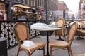 Helsinki. Finland. January 19, 2021 Robert's Coffee, Helsinki downtown, Street cafe chairs and tables under the snow