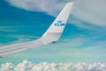 Helsinki, Finland - 7 July 2021: KLM Plain wing over blue sky. Flight from Helsinki to Amsterdam