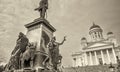 HELSINKI, FINLAND - JULY 3RD, 2017: Tourists visit Helsinki White Cathedral on a cloudy day Royalty Free Stock Photo