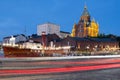 Beautiful night cityscape with illuminated Uspensky Cathedral in the background. An old lighthouse boat in the foreground Royalty Free Stock Photo