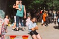 Sad man in black leather shorts on Helsinki Pride festival in Kaivopuisto public park
