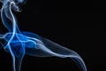 Abstract view of smoke rising up against a dark black background Royalty Free Stock Photo