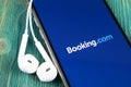 Booking.com application icon on Apple iPhone X screen close-up. Booking app icon. Booking.com. Social media app. Social network