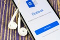 Microsoft Outlook office application icon on Apple iPhone X screen close-up. Microsoft outlook app icon. Microsoft OutLook applica