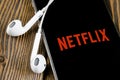 Netflix application icon on Apple iPhone X screen close-up. Netflix app icon. Netflix application. Social media network Royalty Free Stock Photo