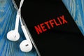 Netflix application icon on Apple iPhone X screen close-up. Netflix app icon. Netflix application. Social media network Royalty Free Stock Photo