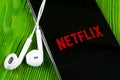 Netflix application icon on Apple iPhone X screen close-up. Netflix app icon. Netflix application. Social media network Royalty Free Stock Photo