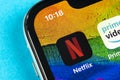 Netflix application icon on Apple iPhone X screen close-up. Netflix app icon. Netflix application. Social media network Royalty Free Stock Photo