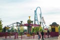 Helsinki, Finland - 21 May 2023: View of Linnanmaki amusement park with rides roller coaster Taiga and carousel Poppis Royalty Free Stock Photo