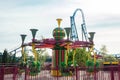 Helsinki, Finland - 21 May 2023: View of Linnanmaki amusement park with rides roller coaster Taiga and carousel Poppis Royalty Free Stock Photo