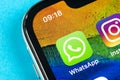 Whatsapp messenger application icon on Apple iPhone X smartphone screen close-up. Whatsapp messenger app icon. Social media icon. Royalty Free Stock Photo