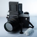 A closeup of a vintage medium format film camera against white background Royalty Free Stock Photo