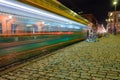 Helsinki, Finland November 22, 2020 Senate Square. Blurred public transport traffic, tram in the city center at night