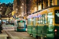 Helsinki, Finland. Tram Departs From Stop On Aleksanterinkatu Street. Night Evening Christmas Xmas New Year Festive