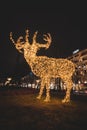 17.12.2021 - Helsinki. A sturdy artificial reindeer glowing orange to delight young visitors to the Finnish capital during the