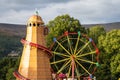 Helter Skelter and Ferris Wheel Ride Royalty Free Stock Photo