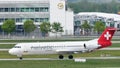 Helvetic Airways plane taxiing in Munich Airport