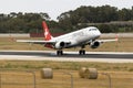 Helvetic Embraer arriving runway 31. Royalty Free Stock Photo