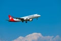 Helvetic Swiss airlines airplane preparing for landing at day time in international airport Royalty Free Stock Photo