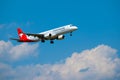 Helvetic Swiss airlines airplane preparing for landing at day time in international airport Royalty Free Stock Photo