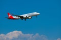 Helvetic Swiss airlines airplane preparing for landing at day time in international airport Royalty Free Stock Photo