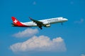 Helvetic Swiss airlines airplane preparing for landing at day time in international airport Royalty Free Stock Photo
