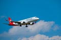 Helvetic Swiss airlines airplane preparing for landing at day time in international airport Royalty Free Stock Photo