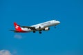 Helvetic Swiss airlines airplane preparing for landing at day time in international airport Royalty Free Stock Photo