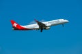 Helvetic Swiss airlines airplane preparing for landing at day time in international airport Royalty Free Stock Photo