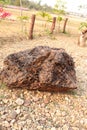 Hematite stone on countryside field