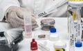 Hematological analysis with forensic test kit in a murder in a crime lab Royalty Free Stock Photo