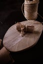 Hemp cloth and rope on wooden background