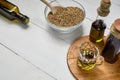 Hemp seed in a glass bowl on the table, Cold pressed oil in a gl Royalty Free Stock Photo