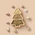 Hemp seeds, flour, kernels in plate shape of Christmas tree. Xmas eco greeting card Royalty Free Stock Photo