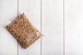 Hemp seeds in transparent packaging on a light wooden background, mockup Royalty Free Stock Photo