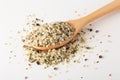 Hemp seeds in wooden spoon Royalty Free Stock Photo