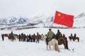Tuva men competing in a horse racing competition in the Altai mountains in China