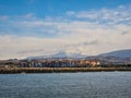 Hendaye traditional French village by the Cantabrian sea, Mount La Rhune Larrun covered by the snow at winter time. Landscape Royalty Free Stock Photo