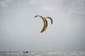 Henichesk, Ukraine - July 12, 2021: Foiling kiteboarding kitesurfing kiteboarder in ocean. Kitesurfing. Seascape with kitesurfer.