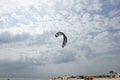 Henichesk, Ukraine - July 12, 2021: Kitesurfing. Practicing kitesurfing at summer beach. Active travel sport recreation.