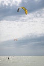 Henichesk, Ukraine - July 12, 2021: Kitesurfing. Practicing kitesurfing at summer beach. Active travel sport recreation.