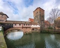 Henkerbrucke bridge and Wasserturm (Water Tower) at Pegnitz River - Nuremberg, Bavaria, Germany Royalty Free Stock Photo