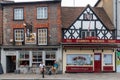 Two men having a drink outside the Three Tuns Public house Royalty Free Stock Photo