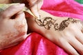 Henna being applied to hand Royalty Free Stock Photo