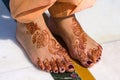 Henna on feet of bride