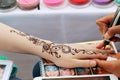 Henna Tattoo making at open air festival White Nights Royalty Free Stock Photo